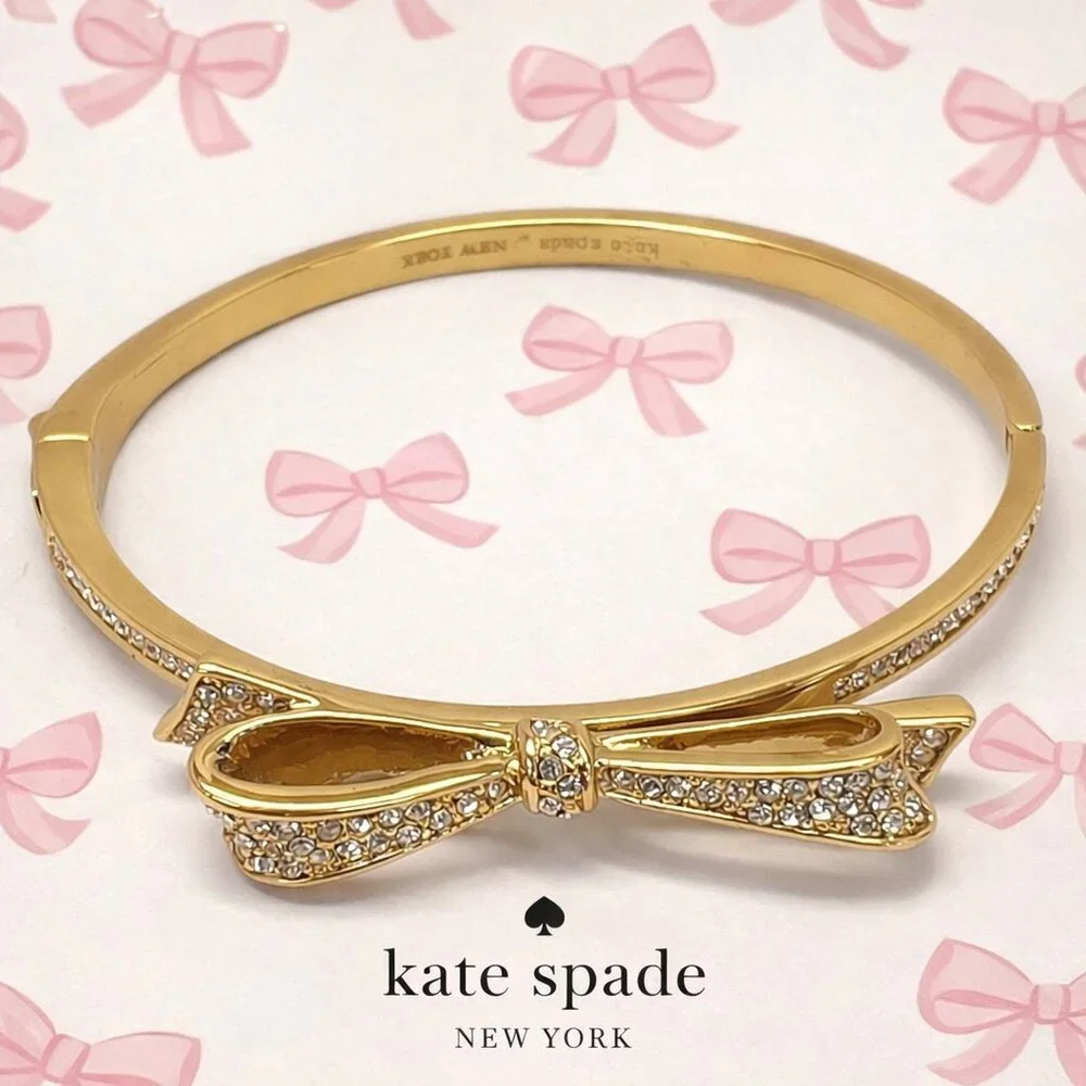 Kate Spade New York Gold Pavé Bow Hinged Bangle Bracelet - Picture 1 of 2